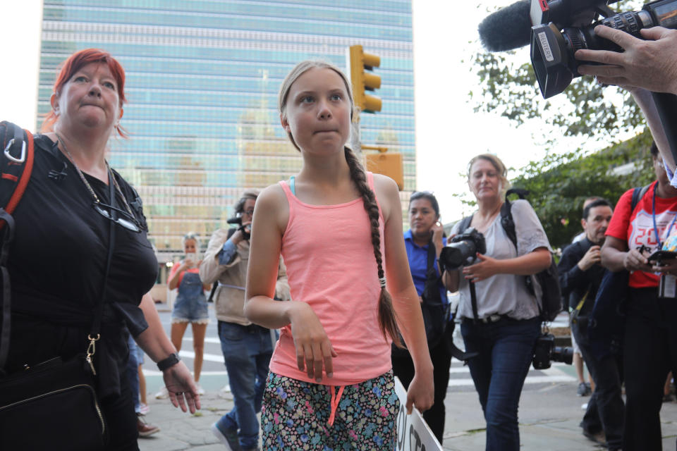 Swedish environmental activist Greta Thunberg arrives for a Youth Climate Strike outside the United Nations, Friday, Aug. 30, 2019. Thunberg is scheduled to address the United Nations Climate Action Summit on September 23. (AP Photo/Bebeto Matthews)