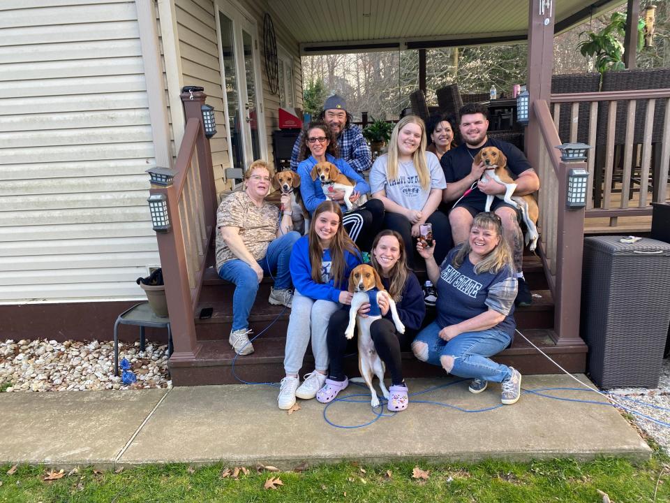 The adopted beagles and their humans.