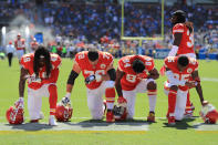 <p>Terrance Smith #48, Eric Fisher #72, Demetrius Harris #84, and Cameron Erving #75 of the Kansas City Chiefs is seen taking a knee before the game against the Los Angeles Chargers at the StubHub Center on September 24, 2017 in Carson, California. (Photo by Sean M. Haffey/Getty Images) </p>