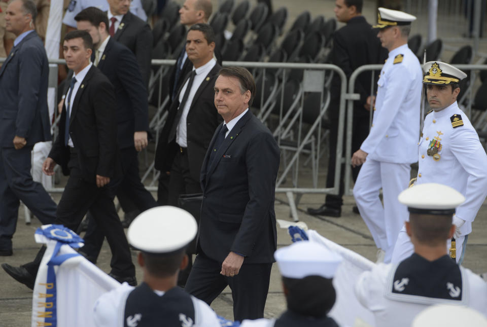 In this photo released by Agencia Brasil, Brazil's President Jair Bolsonaro attends a military ceremony celebrating "Victory Day" marking the participation of Brazil in World War II, in Rio de Janeiro, Brazil, Wednesday, May 8, 2019. Bolsonaro said Rio de Janeiro will host the country's Formula One race in 2020, once the new autodrome is ready. (Tomaz Silva/Agencia Brasil via AP)