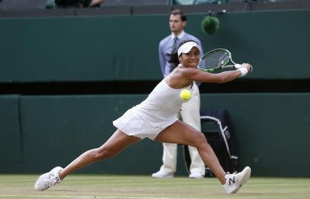 Heather Watson of Britain hits a shot during her match against Serena Williams of the U.S.A. at the Wimbledon Tennis Championships in London, July 3, 2015. REUTERS/Suzanne Plunkett