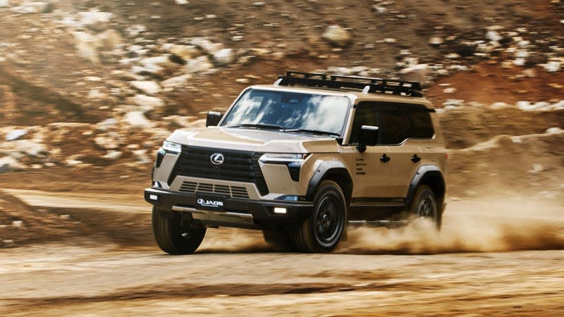 Front 3/4 view of a modified beige Lexus GX driving on dirt