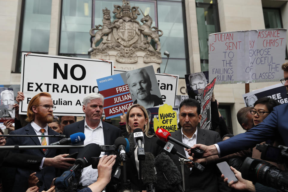 Kristinn Hrafnsson, Editor-in-chief of WikiLeaks and barrister Jennifer Robinson, centre, address the media at Westminster Magistrate Court in London, Thursday, May 2, 2019. WikiLeaks founder Julian Assange is facing court over a U.S. request to extradite him for alleged computer hacking.(AP Photo/Frank Augstein)