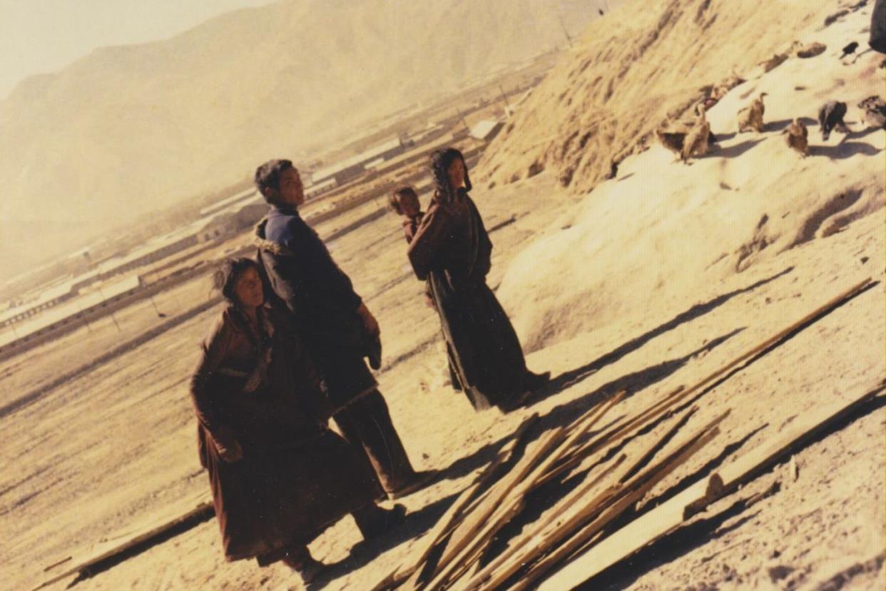 Relatives of the deceased at a sky burial outside Lhasa, Tibet, during the first lunar month, March 1985.