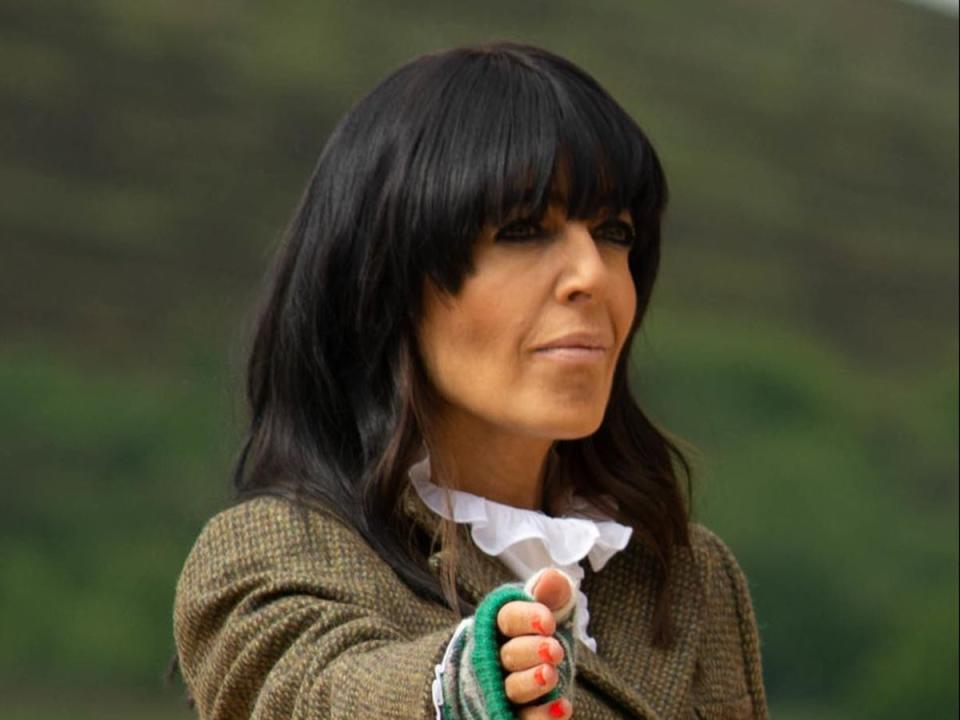 Claudia Winklemas presenting ‘The Traitors’ (BBC)