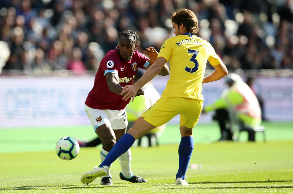 Chelsea’s Marcos Alonso holds off West Ham’s Michail Antonio (left) who spurned two good chances in the space of 90 first-half seconds