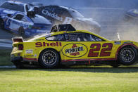 NASCAR Cup Series driver Joey Logano (22) moves during a collision on the final lap of a NASCAR Cup Series auto race at Talladega Superspeedway, Sunday, April 21, 2024, in Talladega. Ala. (AP Photo/Mike Stewart)