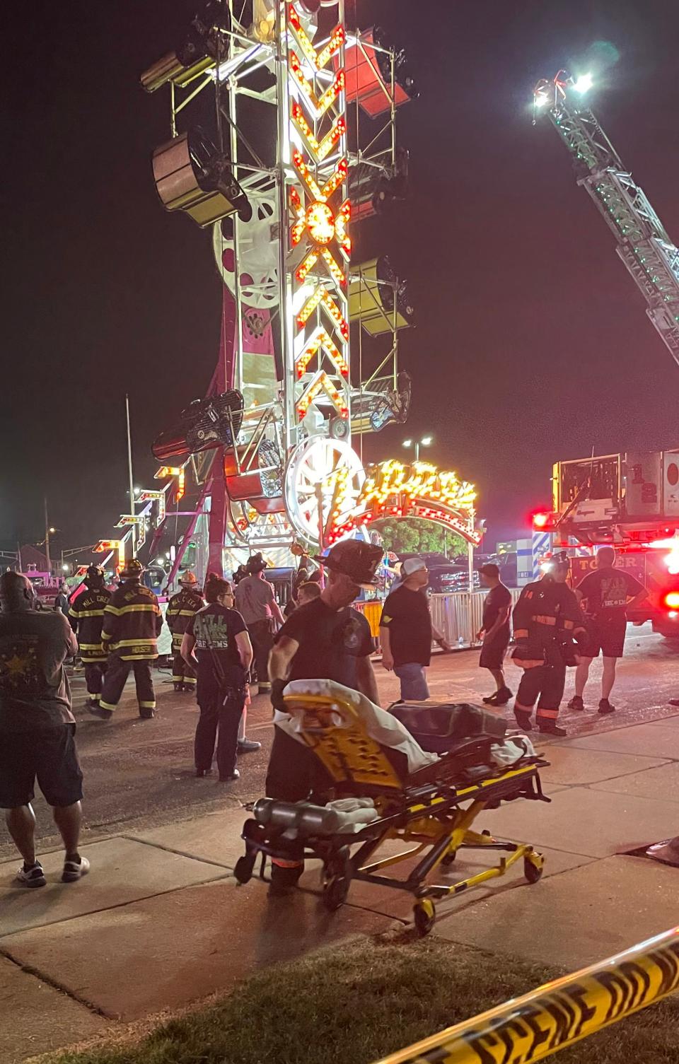 First responders were called to the annual carnival at St. John the Beloved in Milltown after the Zipper carnival ride broke, leaving people trapped on the ride, Tuesday, June 6, 2023.