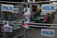 Pictures of Saudi journalist Khashoggi are placed on security barriers during a protest outside the Saudi Consulate in Istanbul, Turkey October 8, 2018. REUTERS/Murad Sezer