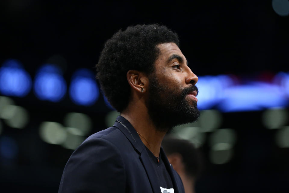 NEW YORK, NEW YORK - DECEMBER 08: Kyrie Irving #11 of the Brooklyn Nets looks on during the game against the Denver Nuggets at Barclays Center on December 08, 2019 in New York City. Brooklyn Nets defeated the Denver Nuggets 105-102. NOTE TO USER: User expressly acknowledges and agrees that, by downloading and or using this photograph, User is consenting to the terms and conditions of the Getty Images License Agreement. Mandatory Copyright Notice: Copyright 2019 NBAE.  (Photo by Mike Stobe/Getty Images)