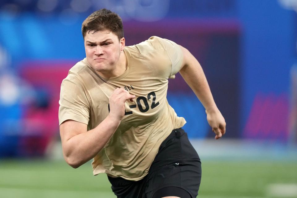 Notre Dame offensive lineman Joe Alt runs during the 2024 NFL Combine at Lucas Oil Stadium in Indianapolis on March 3, 2024.