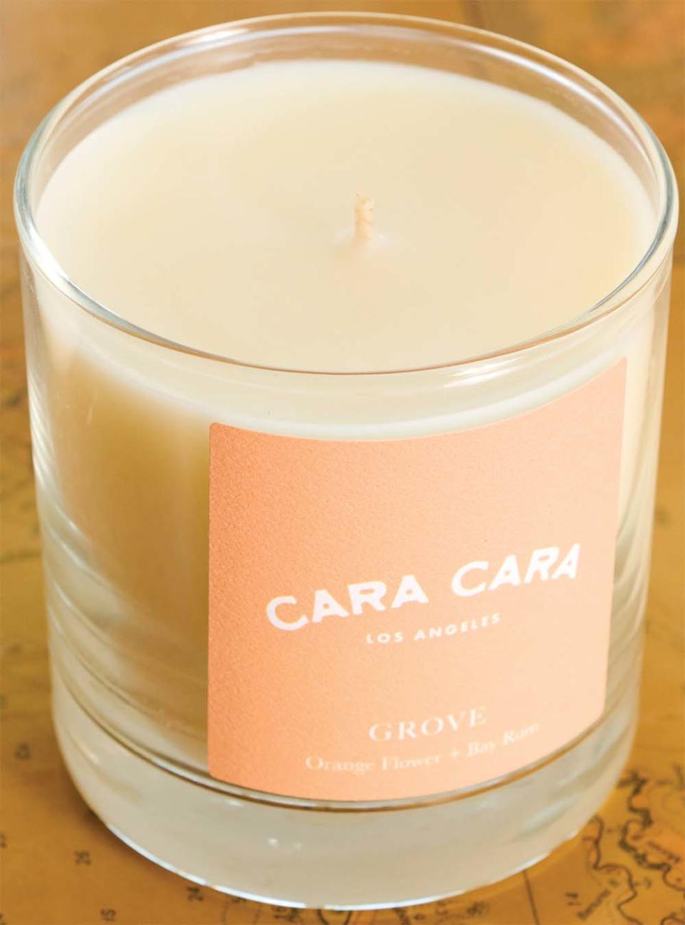 A candle by Rou’s Cara Cara Los Angeles, a sustainable dried flower and gifting brand.