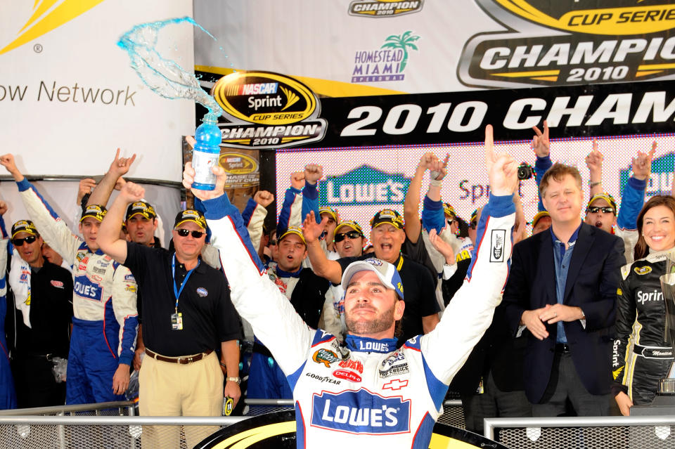 Jimmie Johnson, driver of the #48 Lowe's Chevrolet, celebrates after finishing in second place in the Ford 400 to clinch his fifth consecutive NASCAR Sprint Cup championship at Homestead-Miami Speedway on November 21, 2010 in Homestead, Florida. (Photo by John Harrelson/Getty Images for NASCAR)