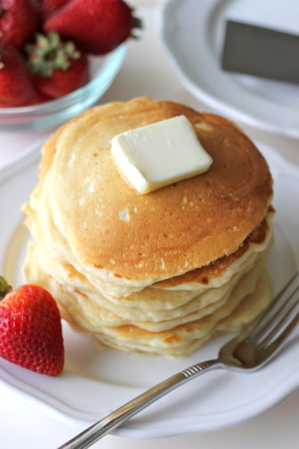 <strong>Get the <a href="http://damndelicious.net/2012/07/23/buttermilk-pancakes-with-strawberry-sauce/" target="_blank">Classic Buttermilk Pancakes recipe</a> from Damn Delicious</strong>