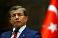 Turkey's Prime Minister Ahmet Davutoglu addresses members of parliament from his ruling AK Party (AKP) during a meeting at the Turkish parliament in Ankara, Turkey, May 3, 2016. REUTERS/Umit Bektas