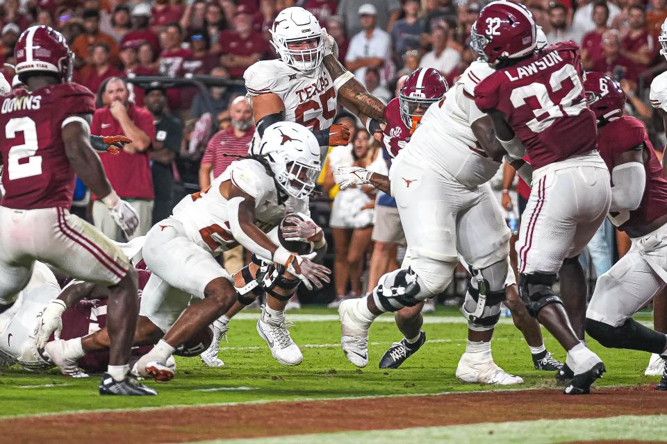 Texas running back Jonathon Brooks runs for a touchdown against Alabama during the Longhorns' win at Bryant-Denny Stadium last September. The Longhorns enter the SEC coming off a College Football Playoff appearance.