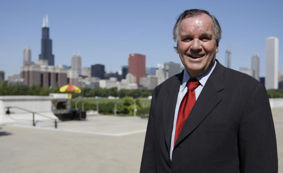 FILE - In this Sept. 18, 2008 file photo Chicago Mayor Richard M. Daley poses with the city skyline behind him after a press conference in Chicago. Current mayor Rahm Emanuel, is intent on fixing what ails the nation’s third-largest city. Emanuel, once nicknamed “Rahmbo” for his fierce political maneuvering, last week announced an agreement with several unions to help bail out the nation’s worst-funded city pension systems, a festering problem he inherited from Daley. Emanuel’s staff often notes the pension shortfall is the handiwork of the Daley administration, which failed for years to make enough contributions to the retirement funds for city laborers, police, firefighters and teachers. It was a problem rarely mentioned as Daley built a reputation for having modernized and beautified “the city that works,” and having saved it from the woeful fate of other Rust Belt cities. (AP Photo/M. Spencer Green,File)