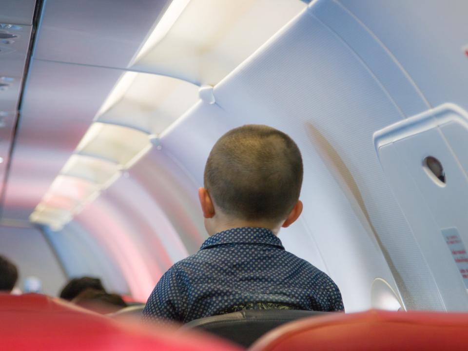 child on airplane