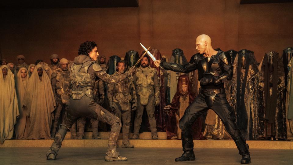 Paul (Timothée Chalamet) and Feyd-Rautha (Austin Butler) cross swords in Dune: Part Two