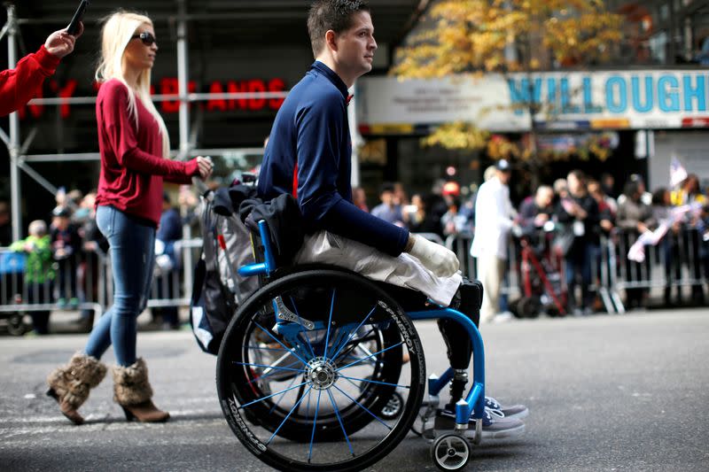 FILE PHOTO: U.S.A.F. Senior Airman Brian Kolfage Jr. attends the Veterans Day parade in New York