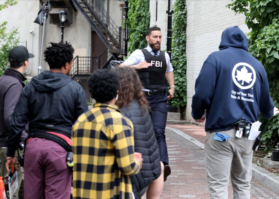 Actor Zeeko Zaki, who plays Special Agent Omar Adom 'OA' Zidan, films a scene for the 4th season of the television show FBI, created by Dick Wolf and Craig Turk, along Main Street and Mill Street in Yonkers, May 13, 2022.