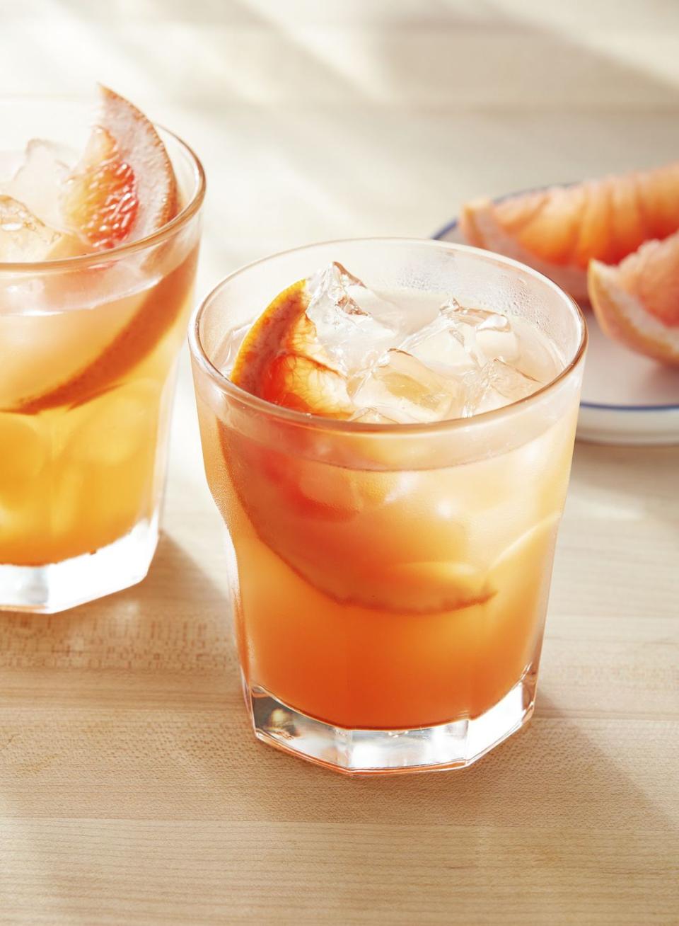 <p>Give yourself a treat with this bright, citrusy cocktail. </p><p><strong><a href="https://www.countryliving.com/food-drinks/a34276057/grapefruit-honey-rosemary-smash/" rel="nofollow noopener" target="_blank" data-ylk="slk:Get the recipe for Grapefruit, Honey, and Rosemary Smash;elm:context_link;itc:0;sec:content-canvas" class="link ">Get the recipe for Grapefruit, Honey, and Rosemary Smash</a>.</strong> </p>