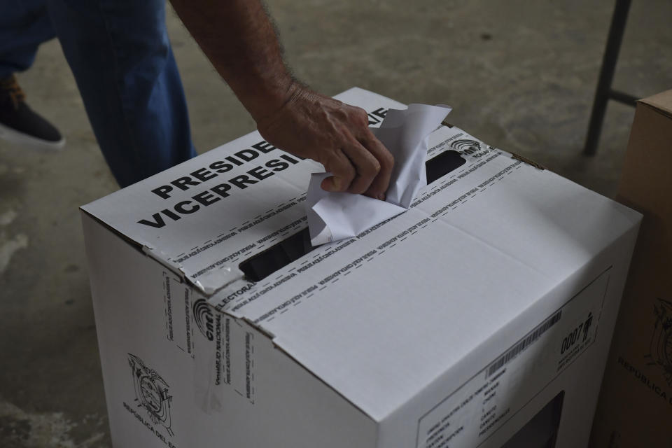 FILE - A voter casts his ballot in a snap election in Canuto, Ecuador, Sunday, Aug. 20, 2023. In a historic decision, Ecuadorians voted on Sunday against the oil drilling of Yasuni National Park, which is a protected area in the Amazon that's home to two uncontacted tribes and serves as a biodiversity hotspot. (AP Photo/Ariel Ochoa, File)