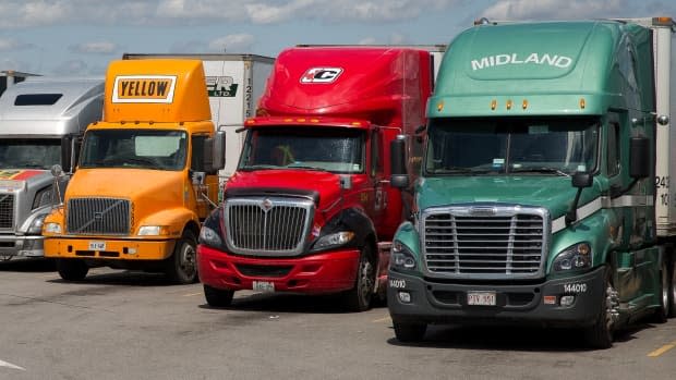 Twenty two truckers tested positive for COVID-19 between early December and April 12, and in turn directly infected 30 people. Eighteen rotational workers tested positive for COVID-19 in the same period and directly infected four people. (David Donnelly/CBC - image credit)