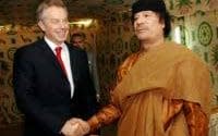 Tony Blair meets Libyan leader Colonel Muammar Gaddafi at his desert base outside Sirte south of Tripoli in 2007.  - PA