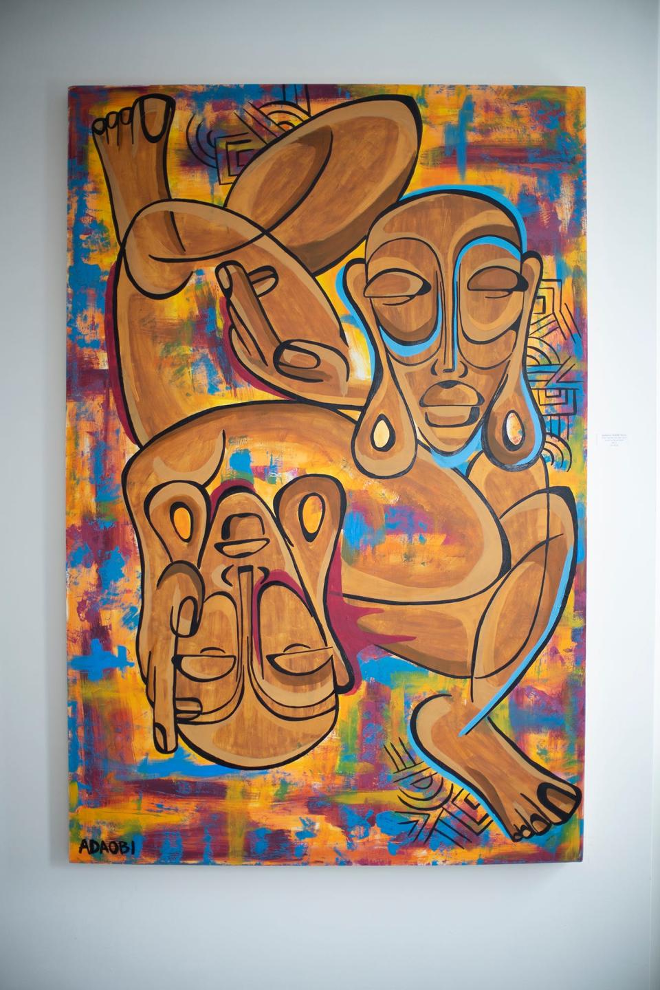 "When Two Become One" is part of the exhibit "IJOMAH: The Journey of ADAOBI" by painter AdaObinna Moore.