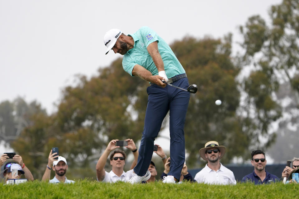 Dustin Johnson plays his shot from the second tee during a practice round of the U.S. Open Golf Championship, Wednesday, June 16, 2021, at Torrey Pines Golf Course in San Diego. (AP Photo/Jae C. Hong)