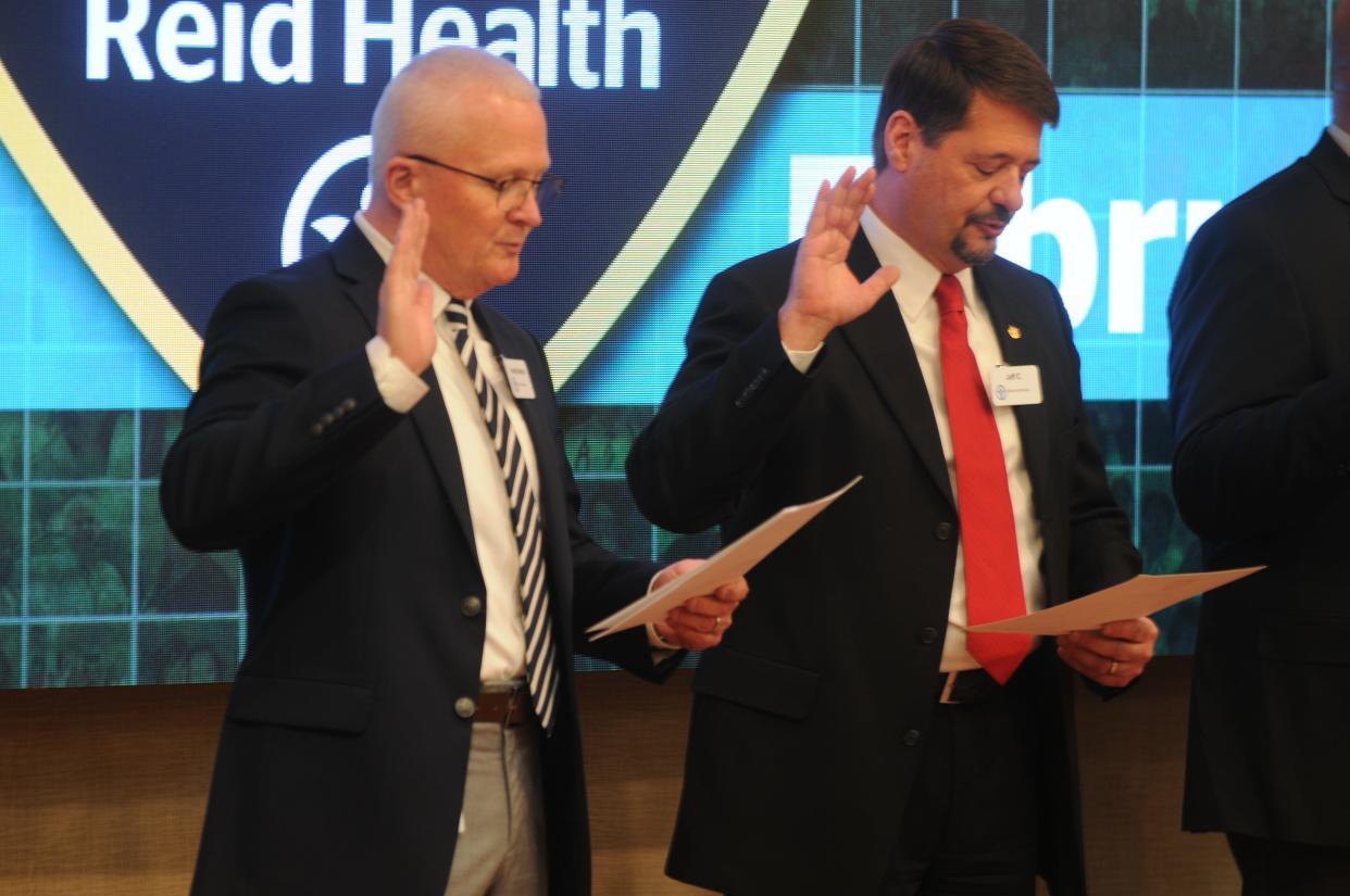 Chief Randy Kolentus and Assistant Chief Jeff Cappa take their oaths during a swearing in ceremony Thursday, Feb. 27, 2020, for the Reid Health Police Force.