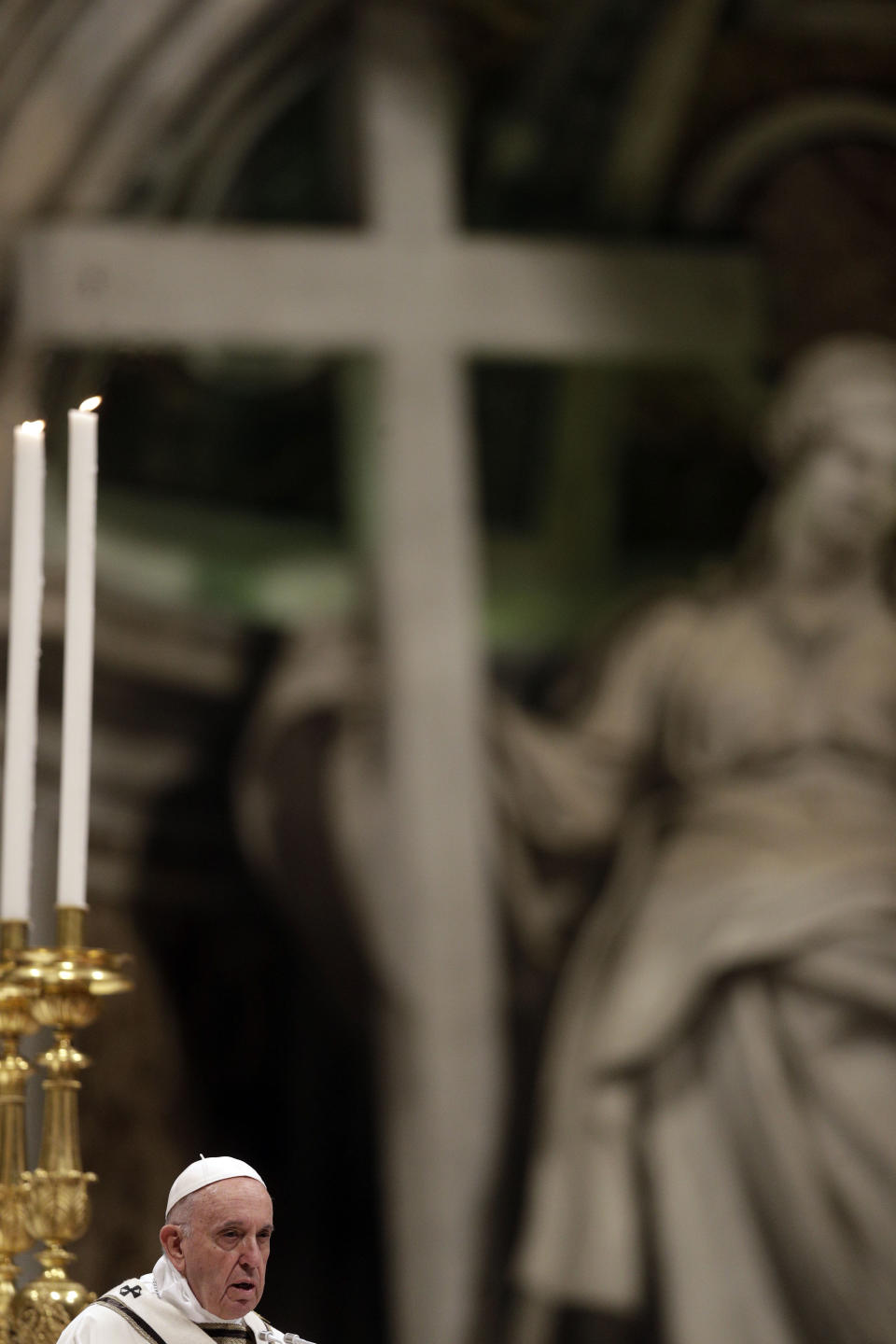 Pope Francis celebrates a Easter vigil mass in St. Peter's Basilica at the Vatican, Saturday, April 20, 2019. (AP Photo/Gregorio Borgia)