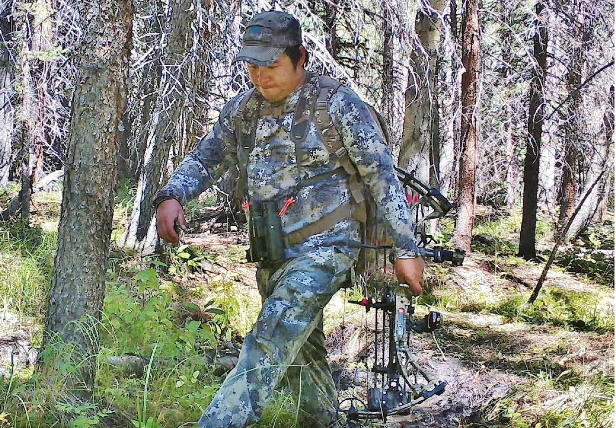 steven samuelson walking through woods