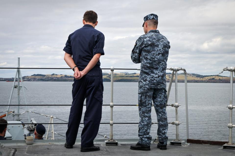 Ukrainian and British sailors standing side by side (MoD/PA)