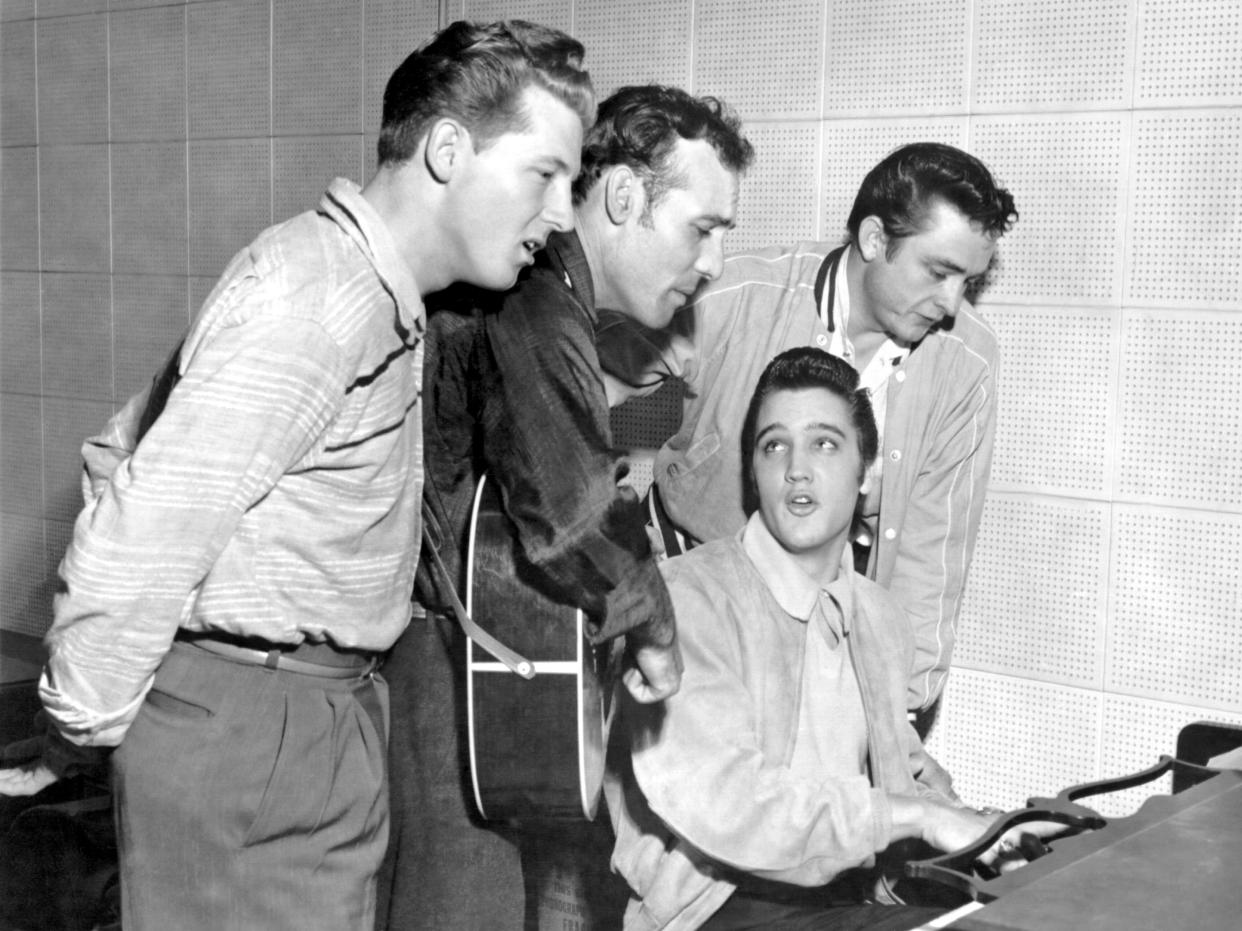 MEMPHIS, TN - DECEMBER 04:  Rock and roll musicians Jerry Lee Lewis, Carl Perkins, Elvis Presley and Johnny Cash as 