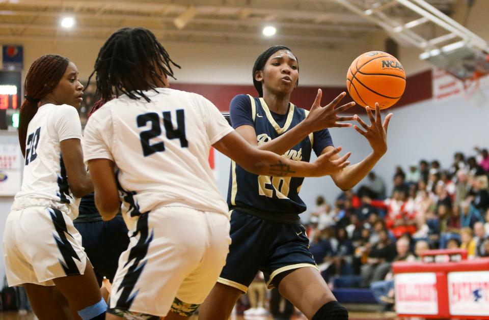 Feb 7, 2023; Tuscaloosa, AL, USA; Paul Bryant guard Adrienne Hunt (20) tries to grab the ball is it bounces away from her and Northridge forward Aniyah Cabbil (24) during the 6A area tournament at Hillcrest High School. 