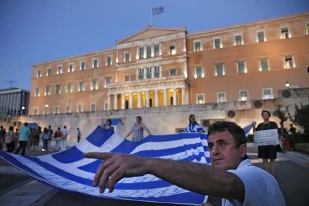 Anti-austerity demonstrators gather in front of parliament in Athens, July 22, 2015. REUTERS/Alkis Konstantinidis