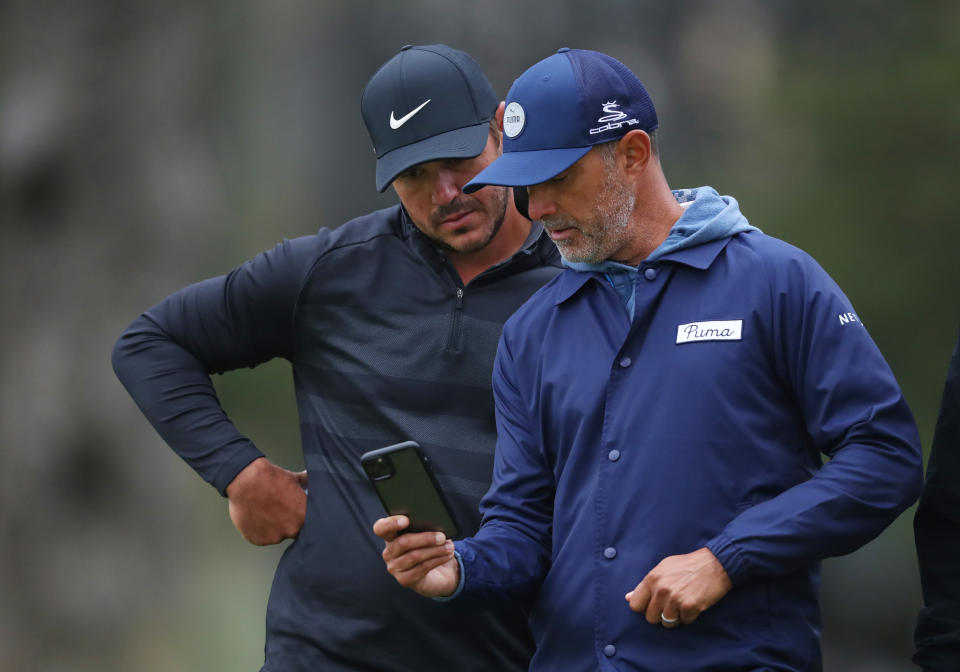 Brooks Koepka and Claude Harmon III