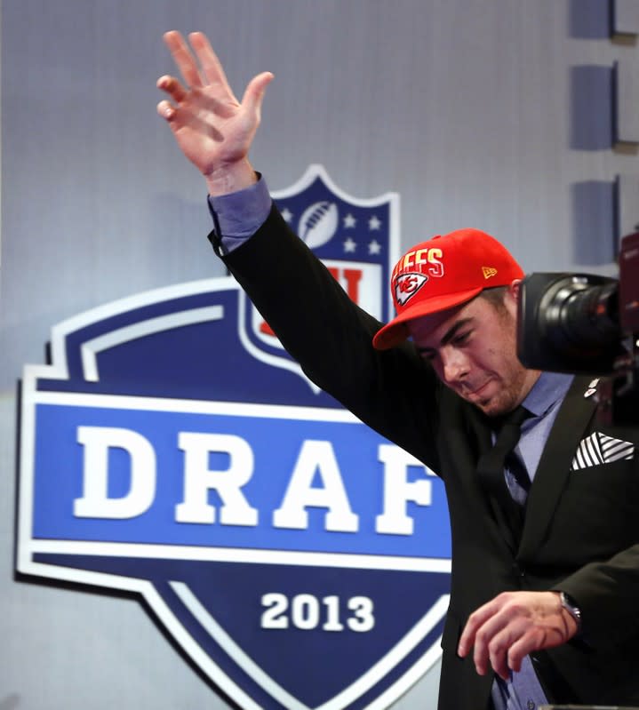 Fisher from Central Michigan University walks onstage after being selected by Kansas City Chiefs as first overall pick in the 2013 NFL Draft in New York