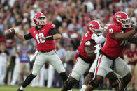 Georgia quarterback JT Daniels (18) throws a pass against South Carolina during the first half of an NCAA college football game Saturday, Sept. 18, 2021, in Athens, Ga. (AP Photo/Butch Dill)