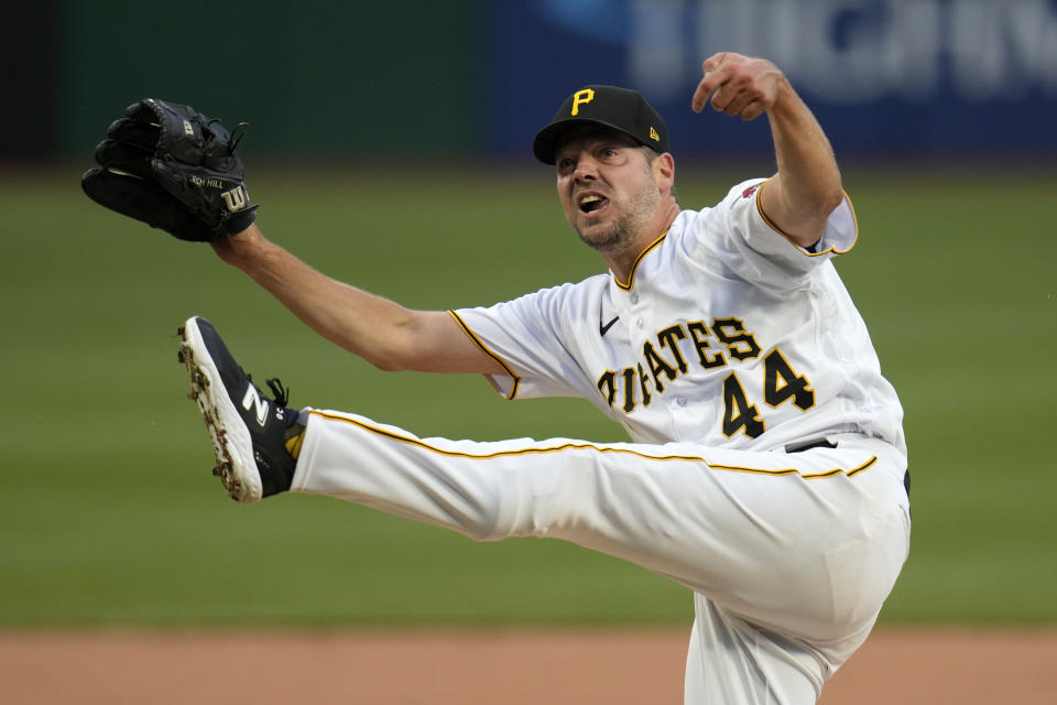 Pittsburgh Pirates starting pitcher Rich Hill follows through on a pitch during the first inning of a baseball game against the Cincinnati Reds in Pittsburgh, Saturday, April 22, 2023. (AP Photo/Gene J. Puskar)