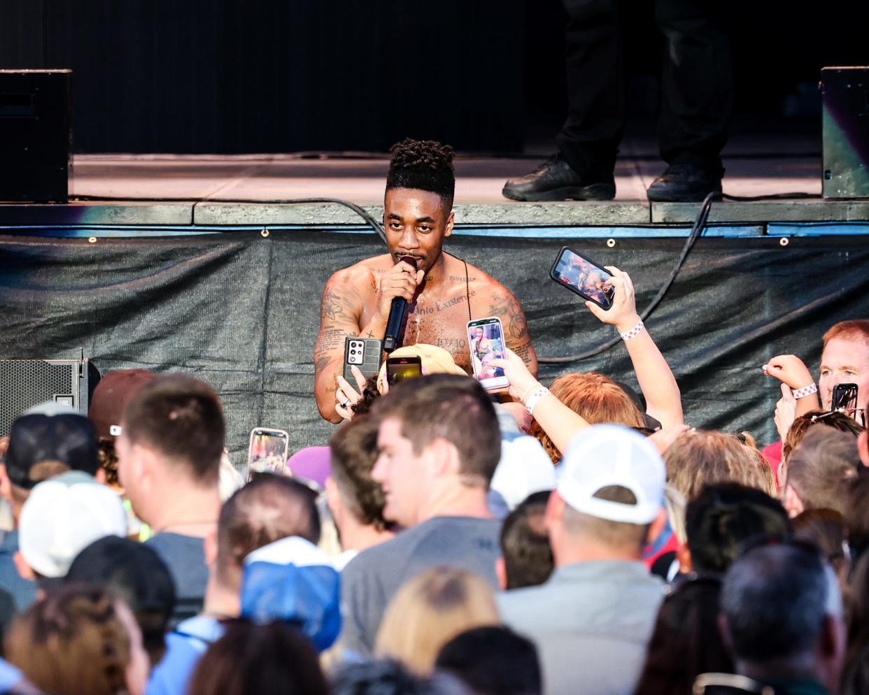 Daniel Nwosu Jr., professionally known by his stage name Dax, opens for Jelly Roll in front of a sold out Grandstand at the Iowa State Fair on Saturday, Aug. 10, 2024.