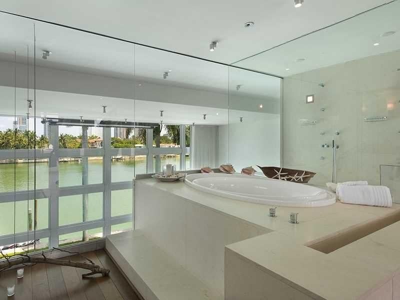 <p>There’s also a massive roman tub that oversees the main room. (Realtor.com) </p>