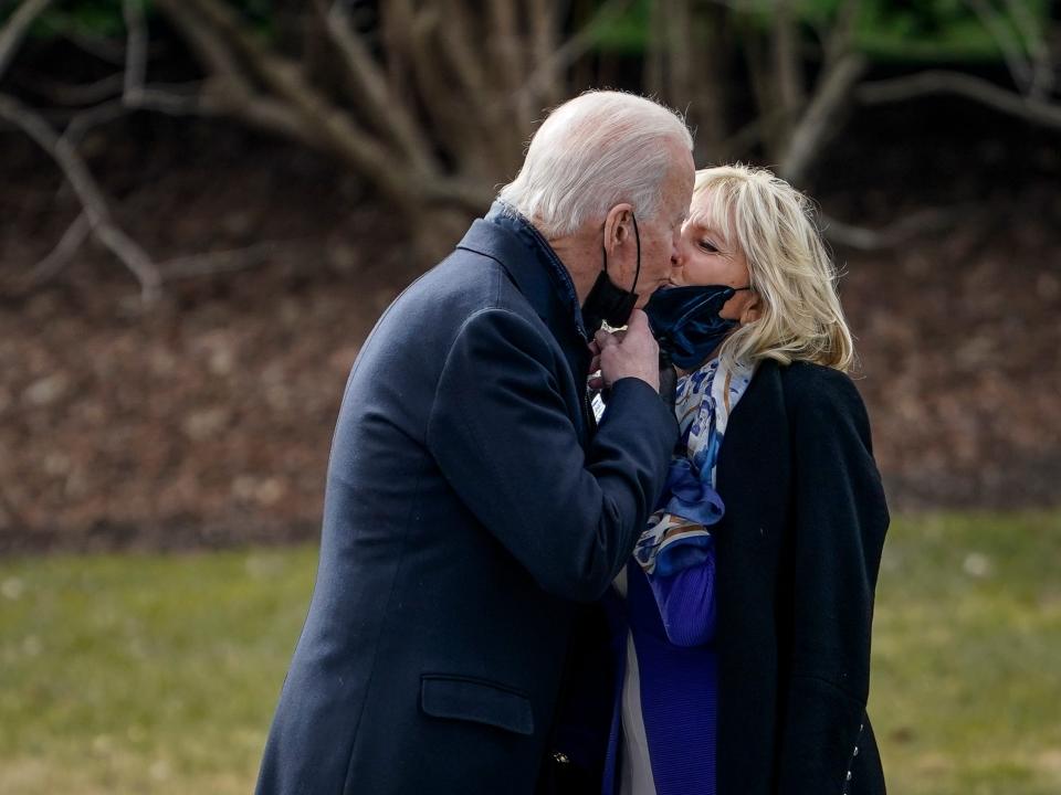 President Joe Biden kisses first lady Jill Biden as he walks to Marine One in 2021.