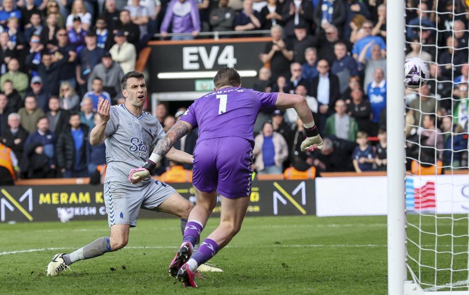 Seamus Coleman of Everton puts the ball past his own keeper Jordan Pickford