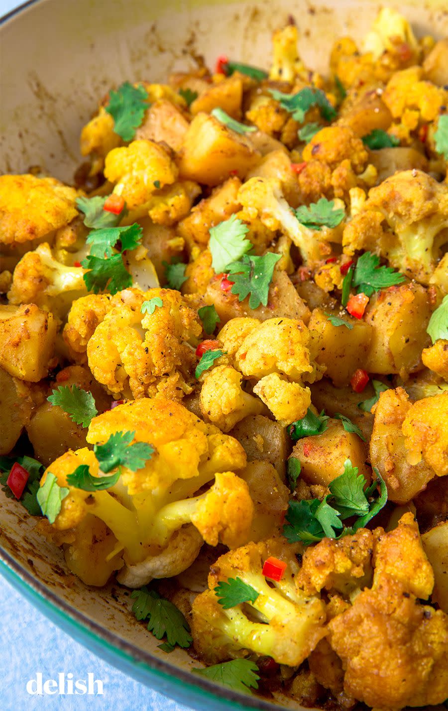 <p>Aloo Gobi is a classic vegetarian <a href="https://www.delish.com/cooking/g1899/simply-indian-recipes/" rel="nofollow noopener" target="_blank" data-ylk="slk:Indian;elm:context_link;itc:0;sec:content-canvas" class="link ">Indian</a> dish translating to potatoes (<em>aloo</em>) and cauliflower (<em>gobi</em>). It's a one-pot, super simple, comforting dish that's ready quickly—serve it as a side or over rice as a main.</p><p>Get the <strong><a href="https://www.delish.com/cooking/recipe-ideas/a25238365/aloo-gobi-indian-cauliflower-recipe/" rel="nofollow noopener" target="_blank" data-ylk="slk:Aloo Gobi recipe;elm:context_link;itc:0;sec:content-canvas" class="link ">Aloo Gobi recipe</a>.</strong></p>