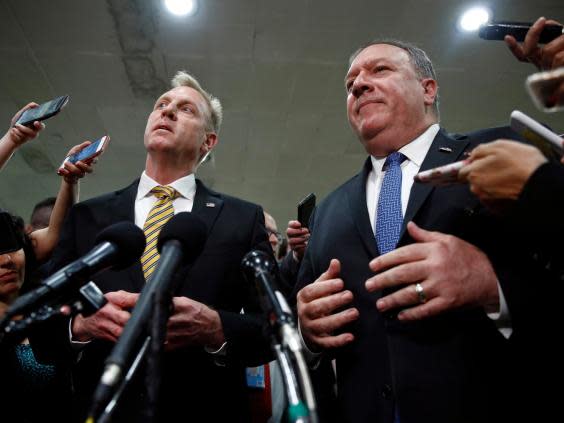 Patrick Shanahan, left, and Mike Pompeo speak after a classified briefing for members of Congress on Iran (AP)