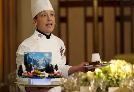 White House pastry chef Susie Morrison displays the dessert entrees for the State Dinner welcoming Canadian Prime Minister Justin Trudeau and his wife Sophie Gregoire Trudeau during a press preview in the State Dining Room of the White House in Washington March 9, 2016. REUTERS/Gary Cameron