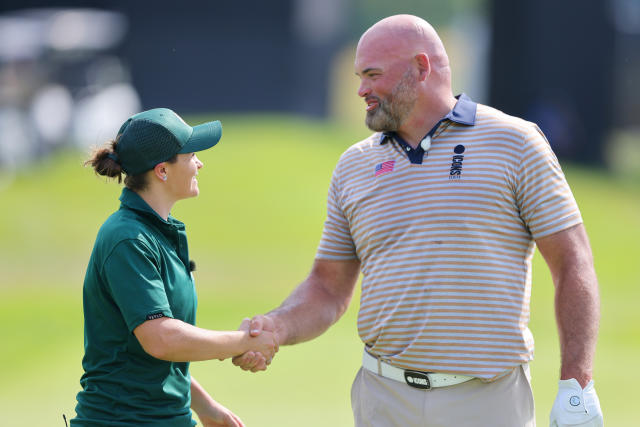 Ash Barty and Andrew Whitworth, pictured here after their singles match at the icons Series golf event.